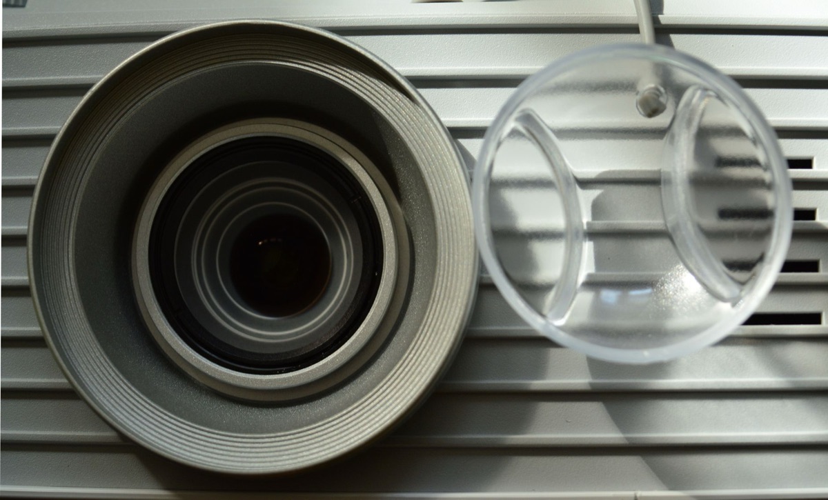 A bright beam of light from a movie projector in a dark theater.