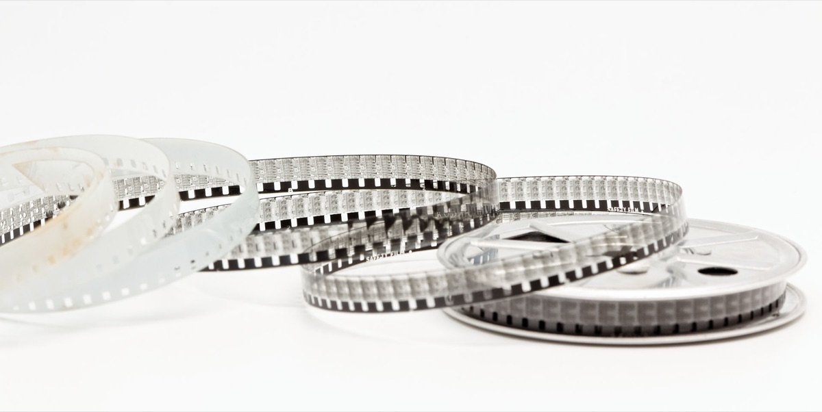 Film reel with camera and lighting setup