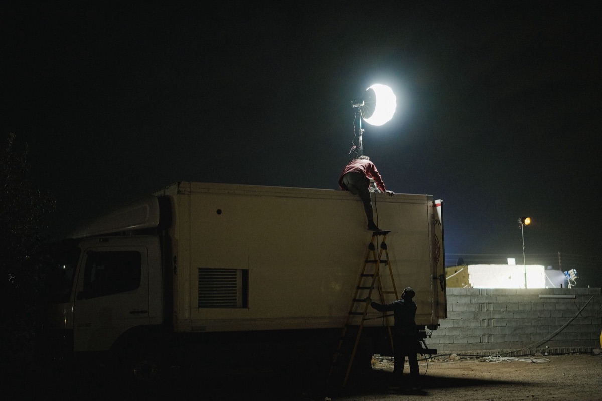 Film set with dramatic lighting and shadows